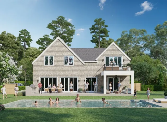 a front view of a residential houses with yard and green space