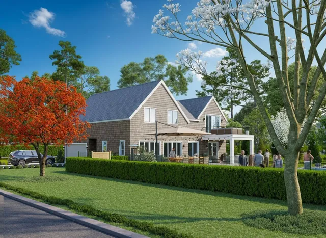 a front view of a house with a garden