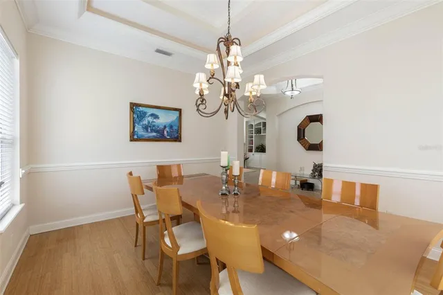 a view of swimming pool with a patio and a yard