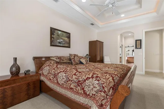 a bathroom with a bathtub sink and mirror