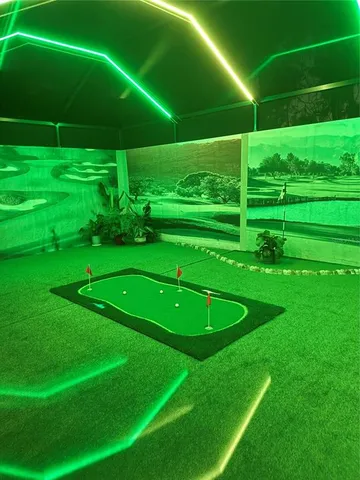 a front view of a house with a garden and yard