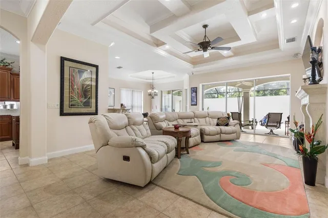a kitchen with granite countertop a sink stainless steel appliances and cabinets