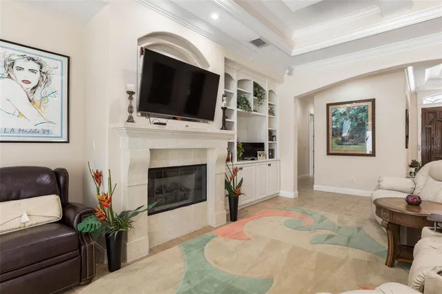 a living room with furniture and a window