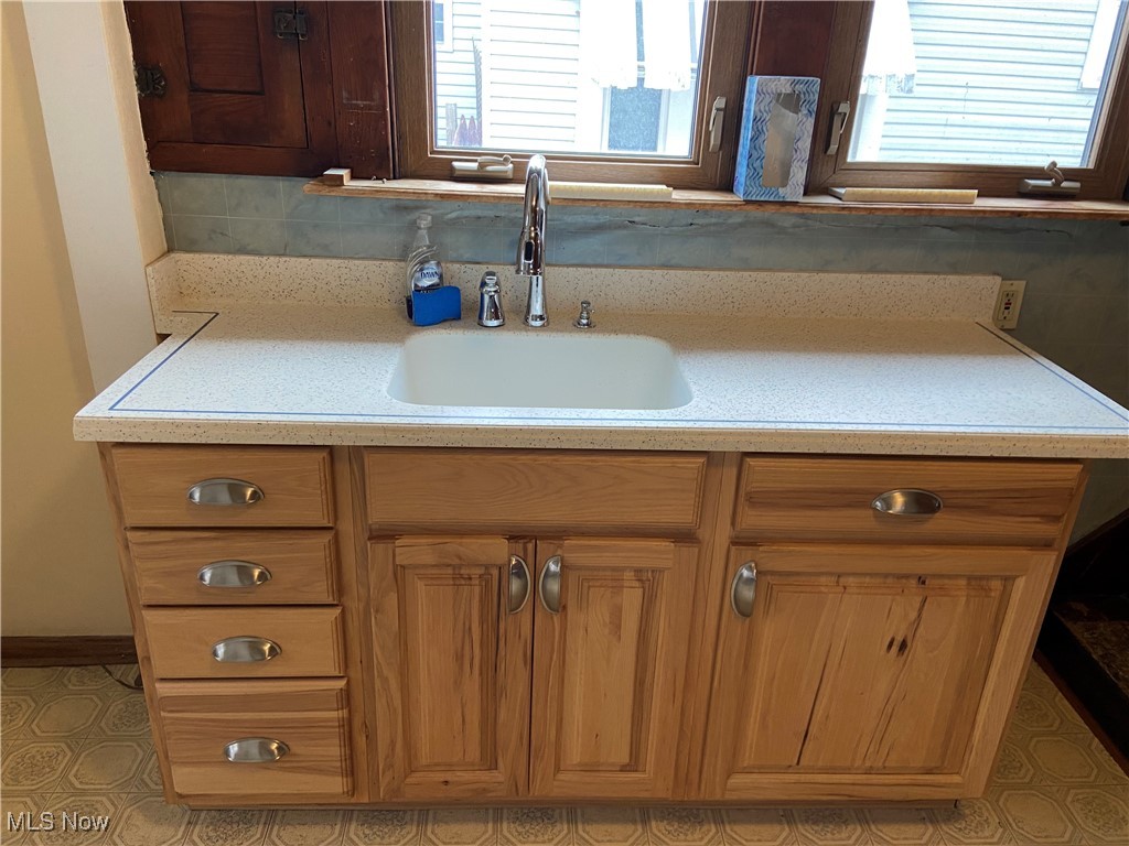 752 Chalker Street Akron, OH 44310 - Photo 14 of 34 Newer kitchen sink and cabinetry