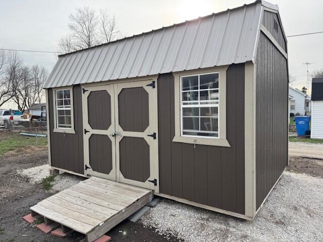 225 Parker Street Bulpitt, IL 62517 - Photo 3 of 12 a wooden door in front of house