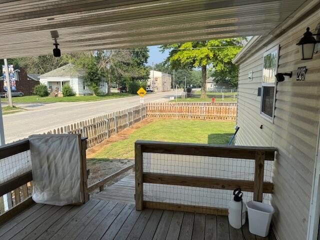 225 Parker Street Bulpitt, IL 62517 - Photo 7 of 12 a view of a patio with table and chairs and potted plants