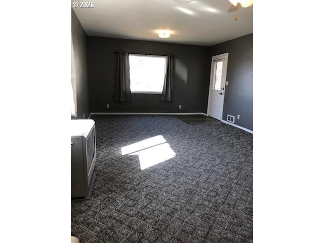 302 West 3rd Street Wallowa, OR 97885 - Photo 4 of 10 a view of empty room with window