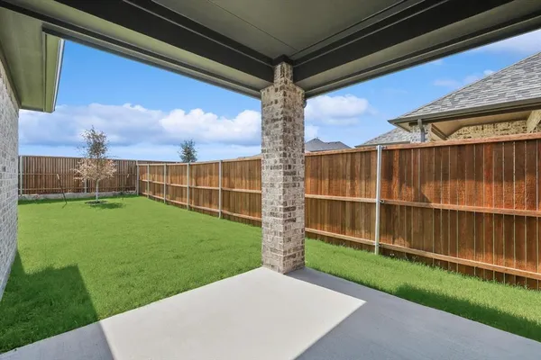 a view of yard with swimming pool and green space