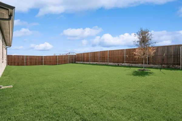 a view of a green yard