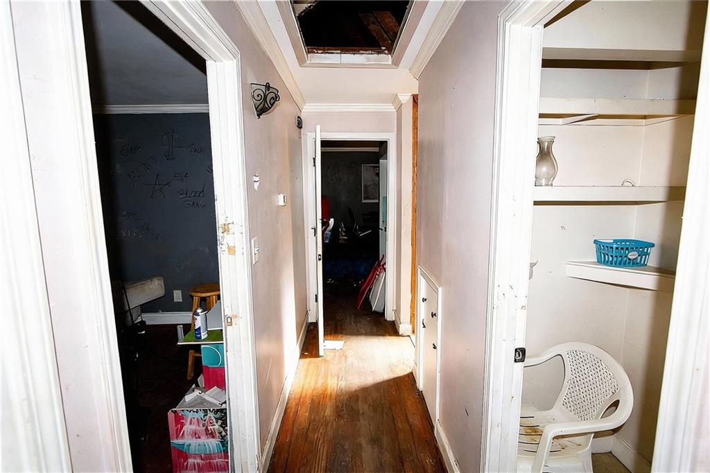 924 Brookdale Place Decatur, GA 30033 - Photo 12 of 19 a view of walk in closet with clothes and shoes