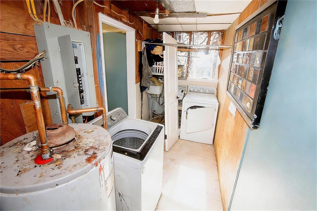 924 Brookdale Place Decatur, GA 30033 - Photo 13 of 19 a view of walk in closet with clothes and shoes