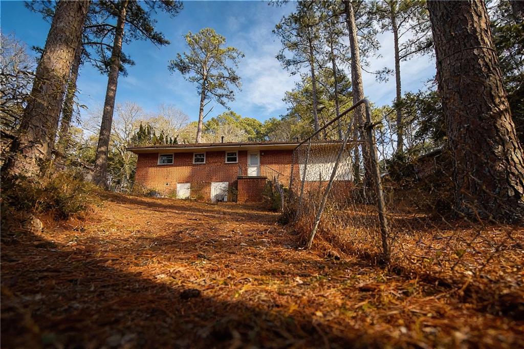 924 Brookdale Place Decatur, GA 30033 - Photo 18 of 19 a view of a tiny house with a yard