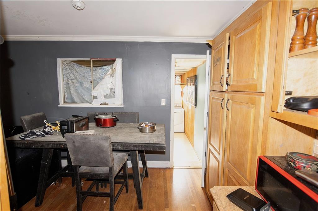 924 Brookdale Place Decatur, GA 30033 - Photo 5 of 19 a view of a dining room with furniture window and wooden floor