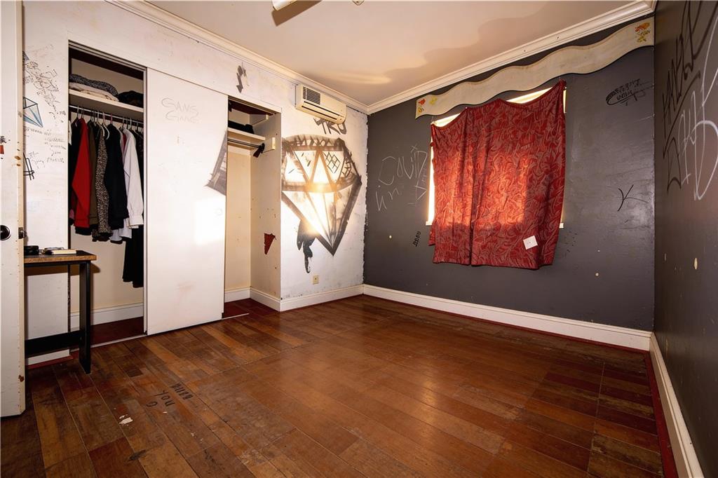 924 Brookdale Place Decatur, GA 30033 - Photo 7 of 19 a view of walk in closet with clothes and shoes