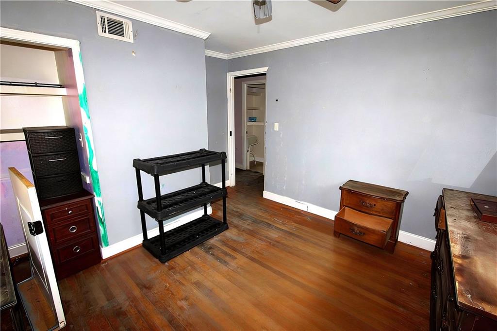 924 Brookdale Place Decatur, GA 30033 - Photo 9 of 19 a room with furniture and a wooden floor