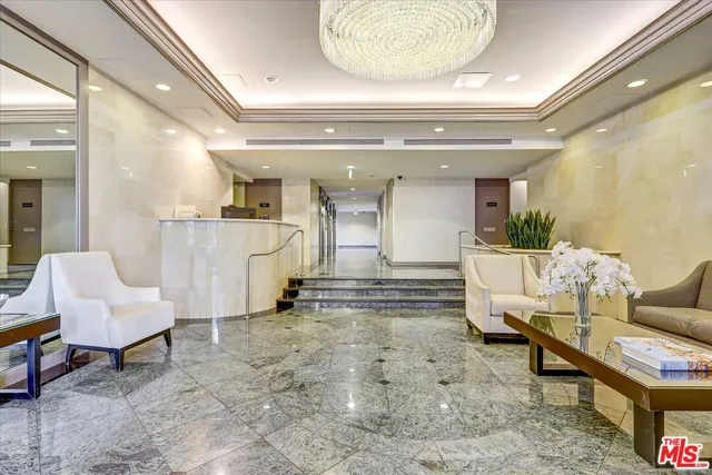 a view of a kitchen from the hallway