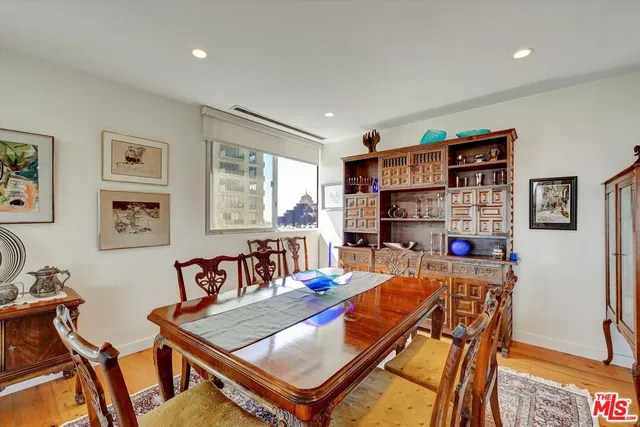 a kitchen with sink and refrigerator