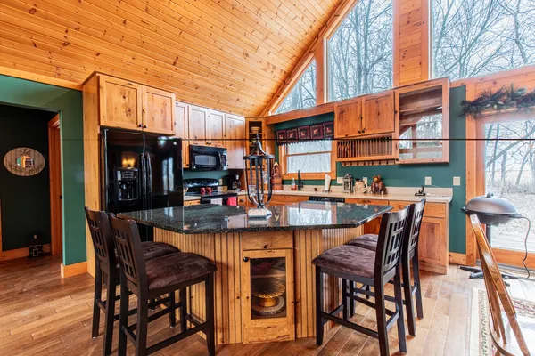 a view of a cafe with sitting area