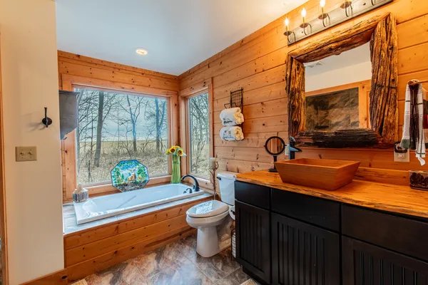 a room with blue lights with furniture