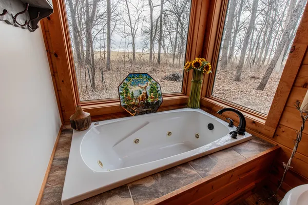 a bath tub sitting next to a tub