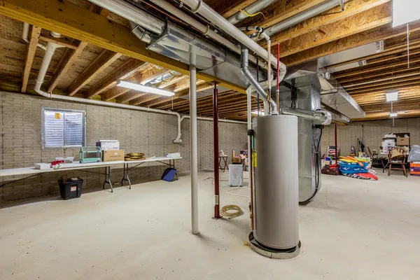 a backyard of a house with a garden and deck