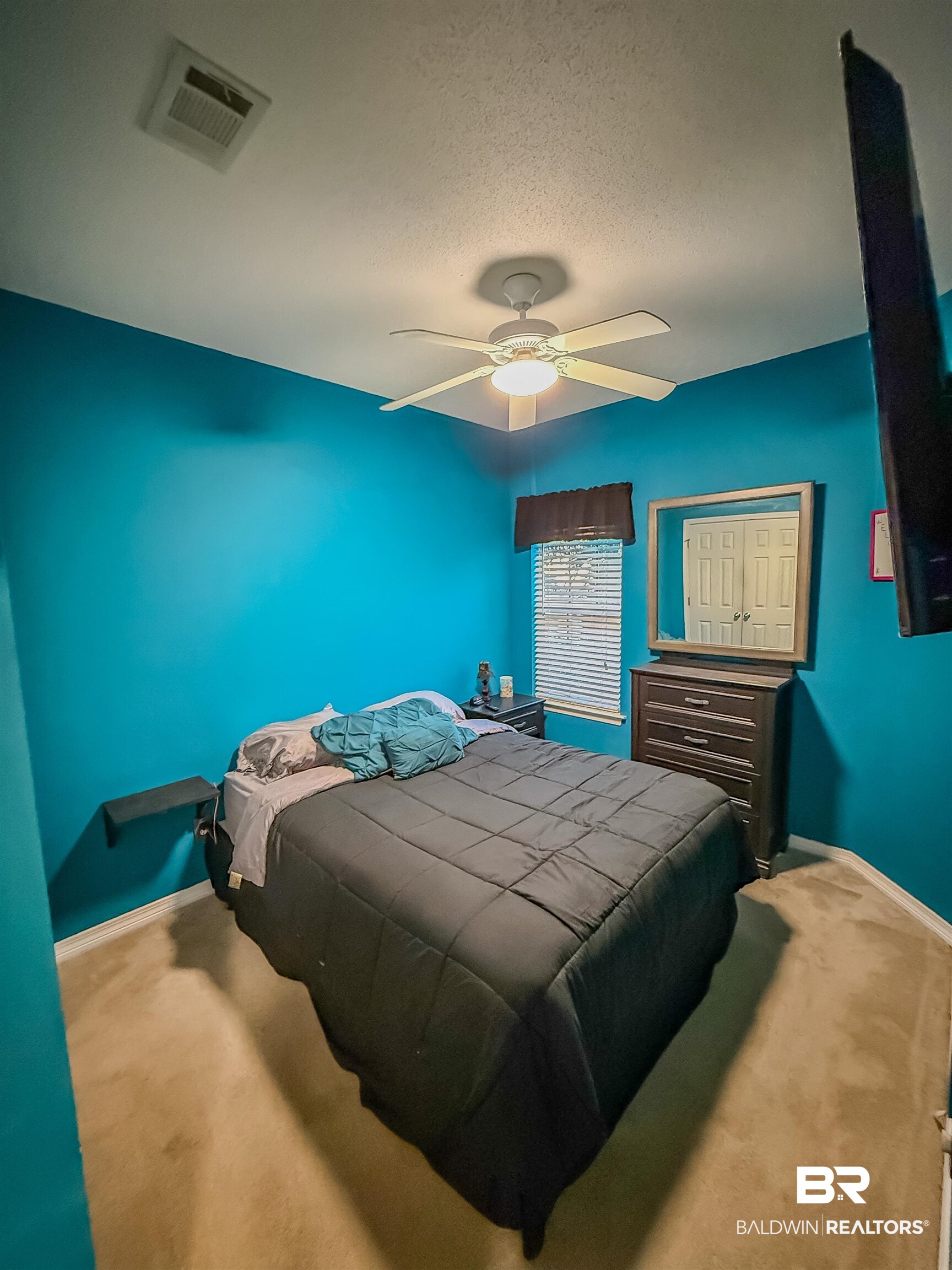 2651 South Juniper Street Foley, AL 36535 - Photo 12 of 20 Carpeted bedroom featuring a textured ceiling and a ceiling fan