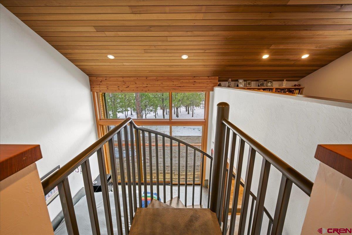 412 South Badger Trail Ridgway, CO 81432 - Photo 18 of 45 a view of staircase with railing and stairs