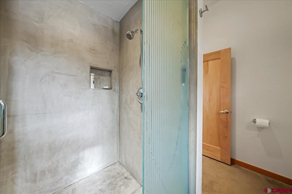 412 South Badger Trail Ridgway, CO 81432 - Photo 31 of 45 a bathroom with a shower