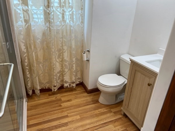 142 Shaw Street Lowell, MA 01851 - Photo 14 of 31 a bathroom with a toilet and a shower