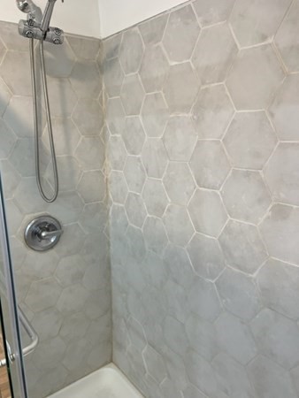 142 Shaw Street Lowell, MA 01851 - Photo 23 of 31 a bathroom with a shower