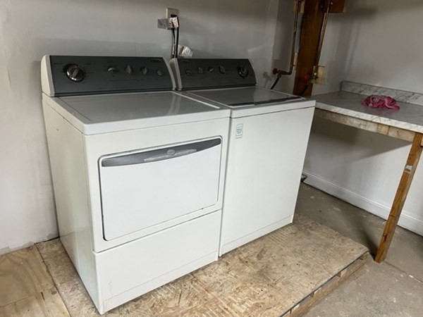 142 Shaw Street Lowell, MA 01851 - Photo 25 of 31 a utility room with dryer and washer