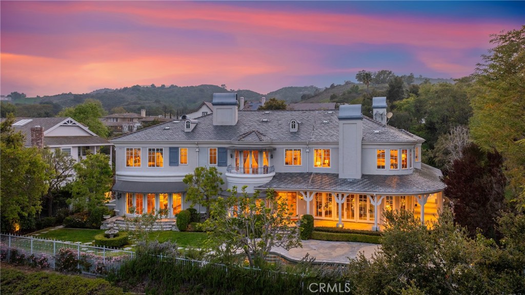 2 Shetland Coto de Caza, CA 92679 - Photo 3 of 6 a front view of a house with a yard and potted plants
