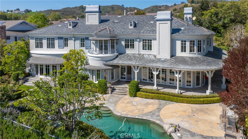2 Shetland Coto de Caza, CA 92679 - Photo 4 of 6 a aerial view of a house with a yard table and chairs