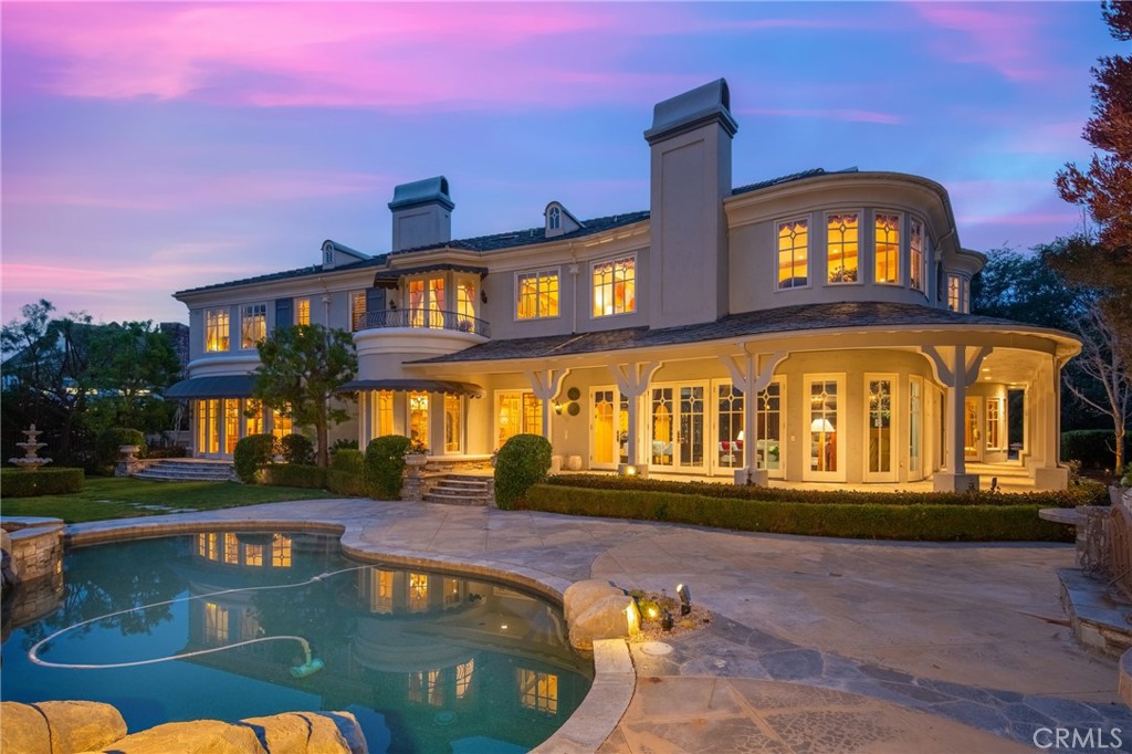 2 Shetland Coto de Caza, CA 92679 - Photo 5 of 6 a front view of a house with a swimming pool