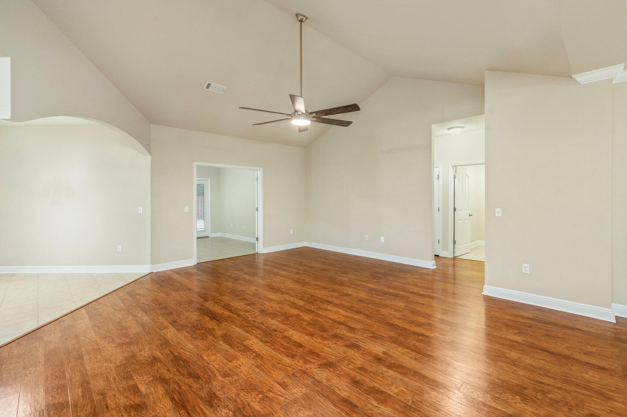 615 Red Fern Road Crestview, FL 32536 - Photo 11 of 33 a view of a livingroom with a ceiling fan window and wooden floor