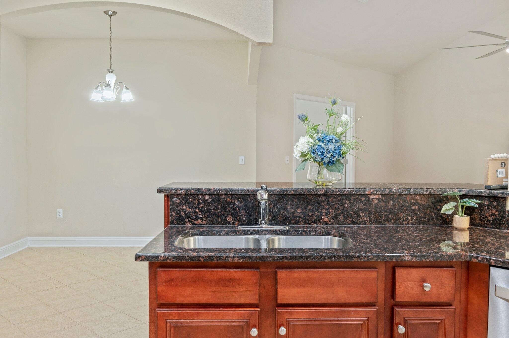 615 Red Fern Road Crestview, FL 32536 - Photo 15 of 33 a view of kitchen island with granite countertop cabinets