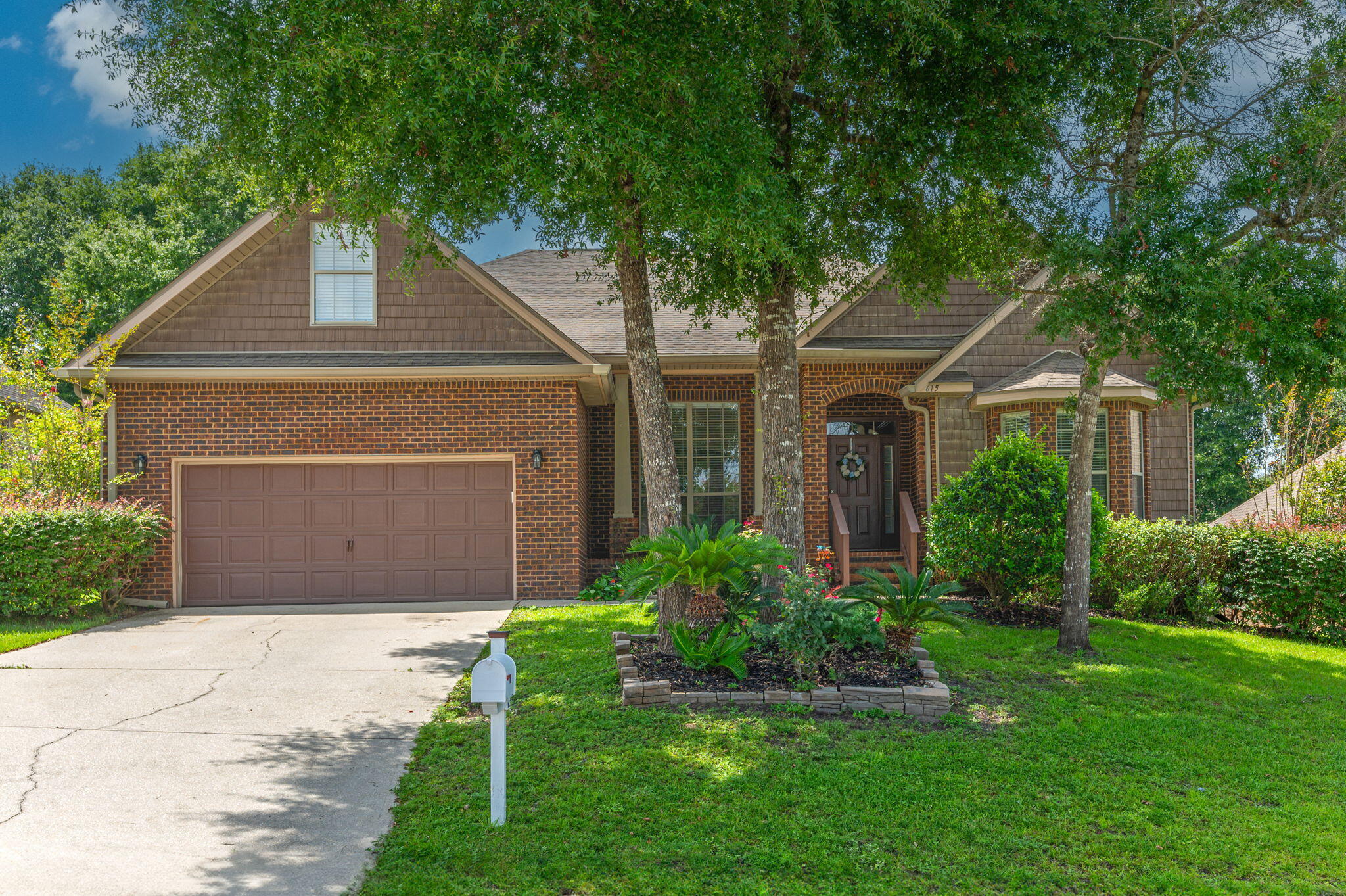 615 Red Fern Road Crestview, FL 32536 - Photo 2 of 33 a front view of house with yard and green space