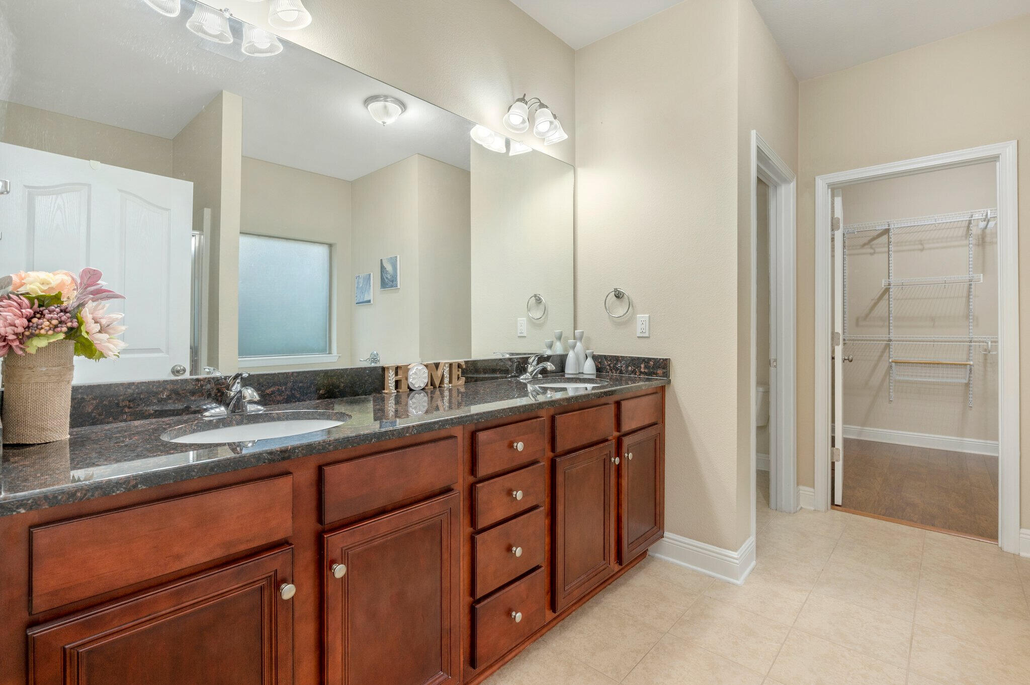 615 Red Fern Road Crestview, FL 32536 - Photo 23 of 33 a bathroom with double sink and a mirror