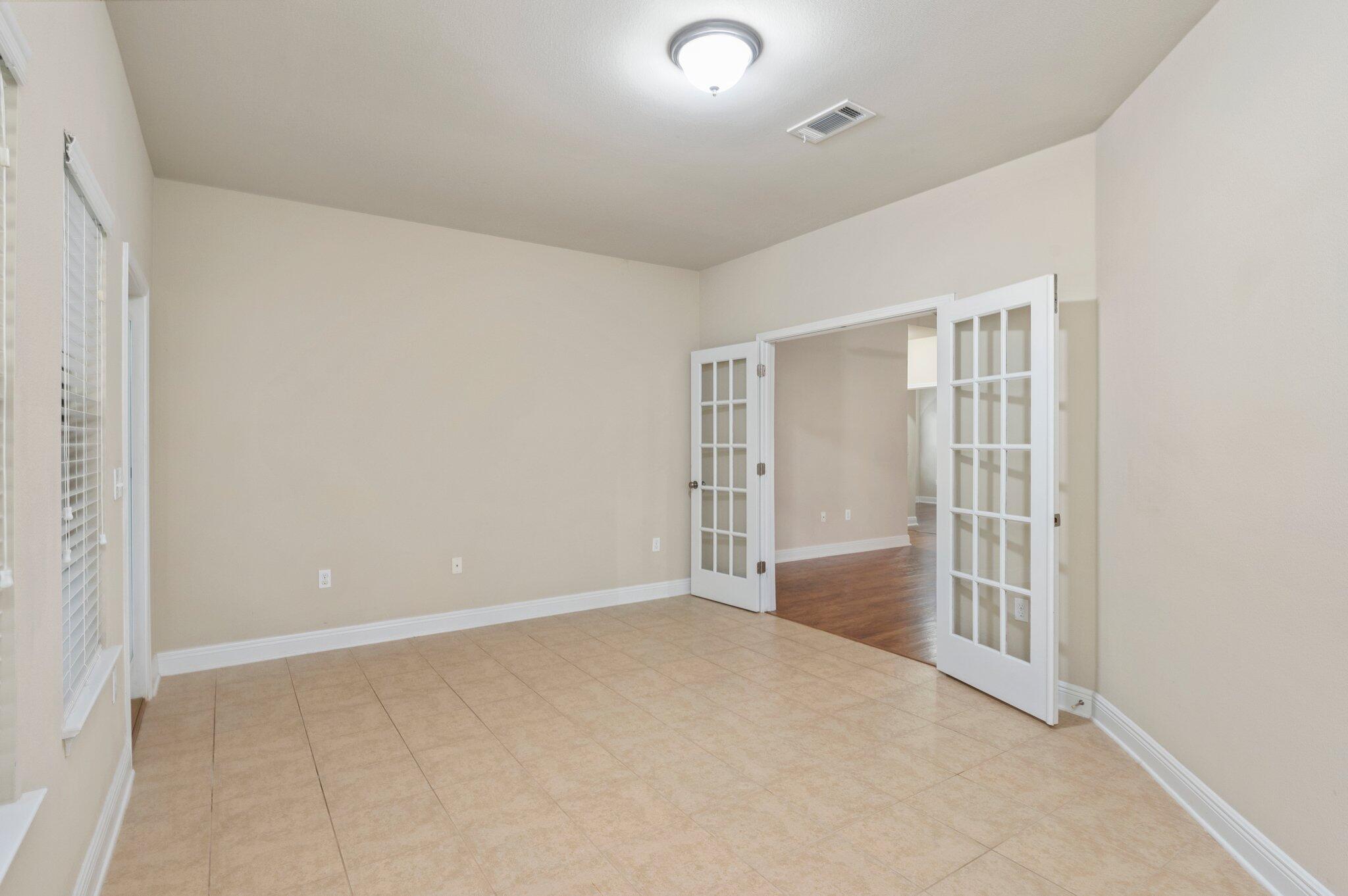 615 Red Fern Road Crestview, FL 32536 - Photo 30 of 33 an empty room with windows