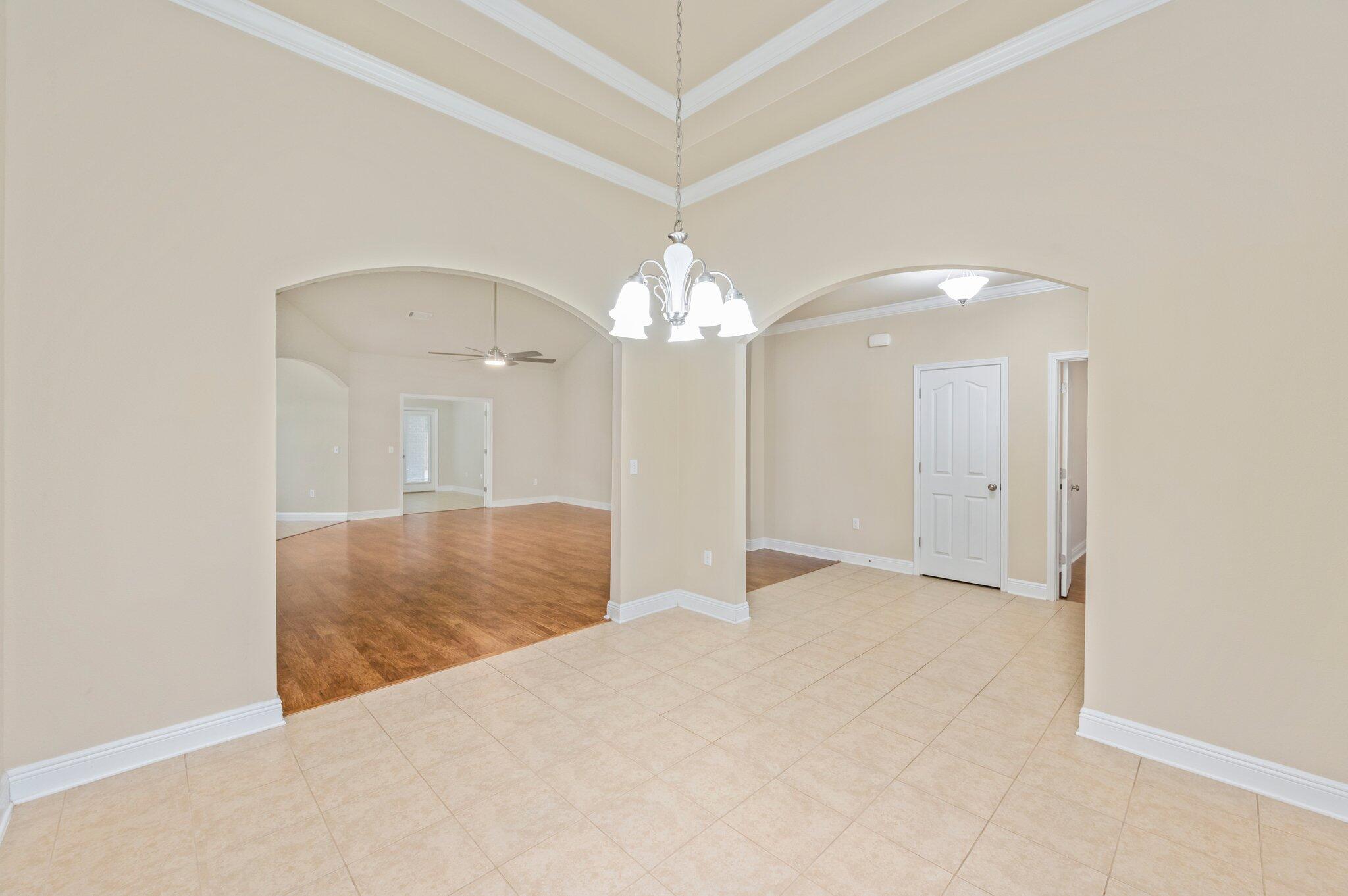615 Red Fern Road Crestview, FL 32536 - Photo 9 of 33 a view of a chandelier fan and entryway