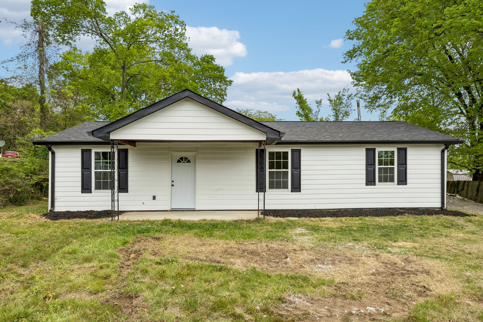 330 West Washington Street Pulaski, TN 38478 - Photo 1 of 36 a house with yard in front of it