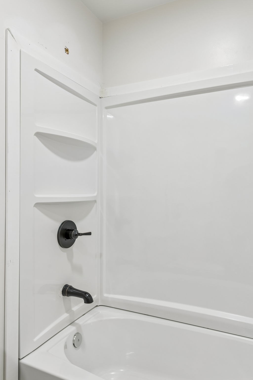 330 West Washington Street Pulaski, TN 38478 - Photo 21 of 36 a bathroom with a shower