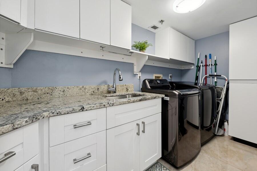 1401 South Ocean Boulevard, Unit 501 Boca Raton, FL 33432 - Photo 42 of 72 Laundry Room