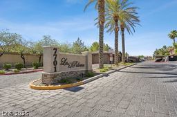 7701 West Robindale Road, Unit 277 Las Vegas, NV 89113 - Photo 1 of 33 A grand entrance welcomes residents to this exclusive, palm-lined community.