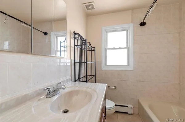 a bathroom with a sink and a bathtub