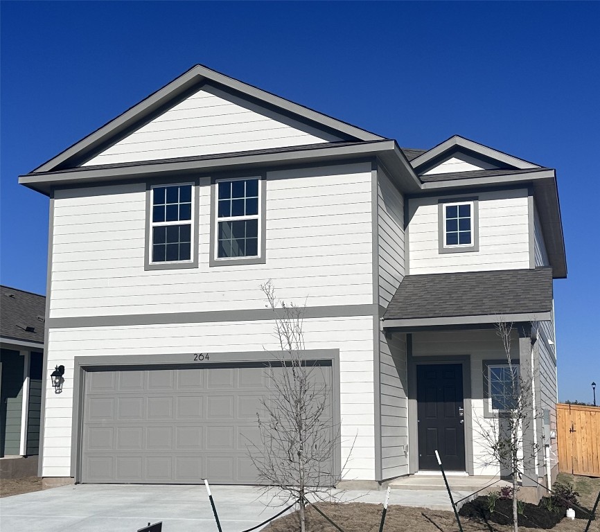 264 Alcatraz Loop Jarrell, TX 76537 - Photo 1 of 1 a front view of a house with yard