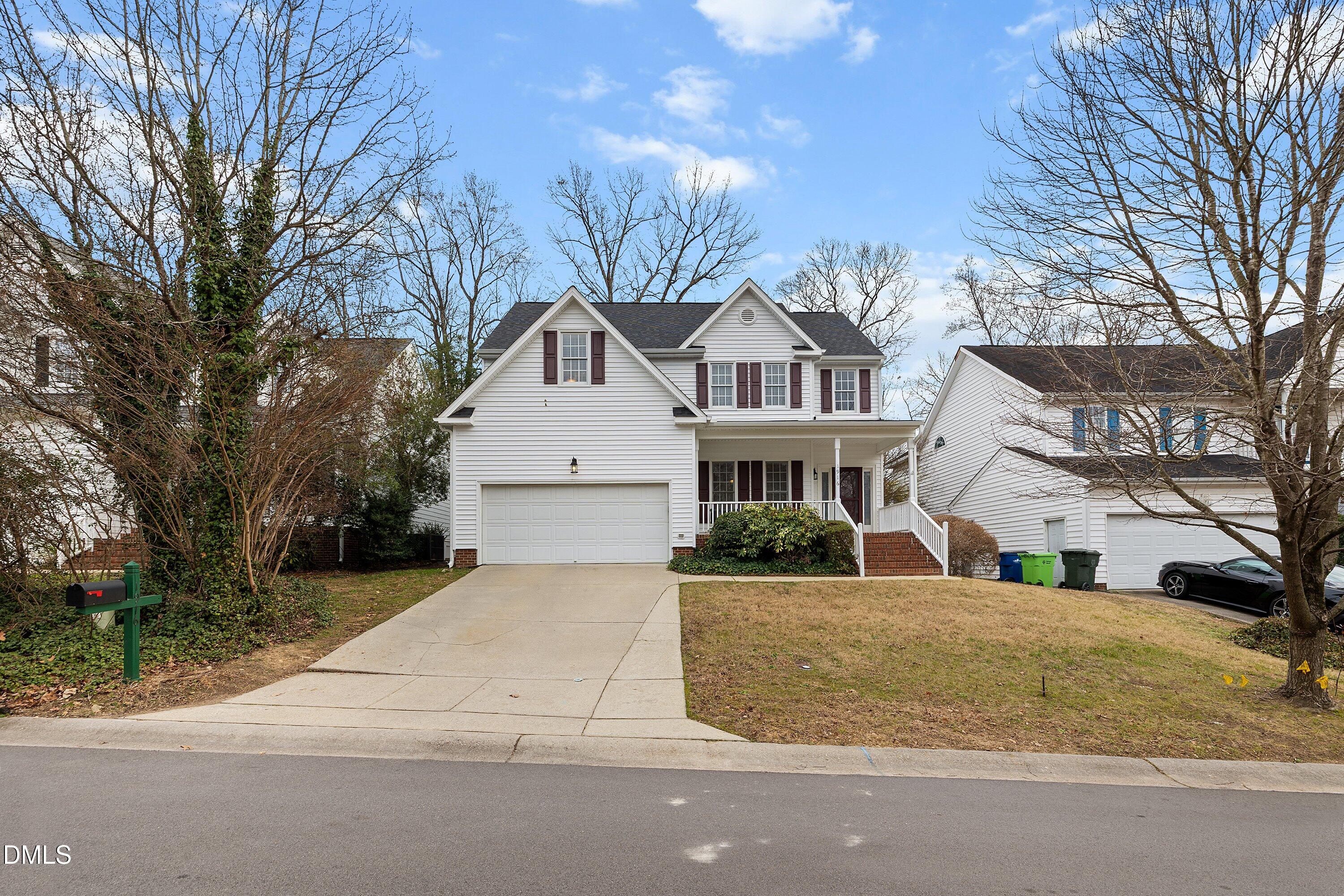 1916 Spanish Bay Court Raleigh, NC 27604 - Photo 2 of 63 a front view of a house with a yard and garage