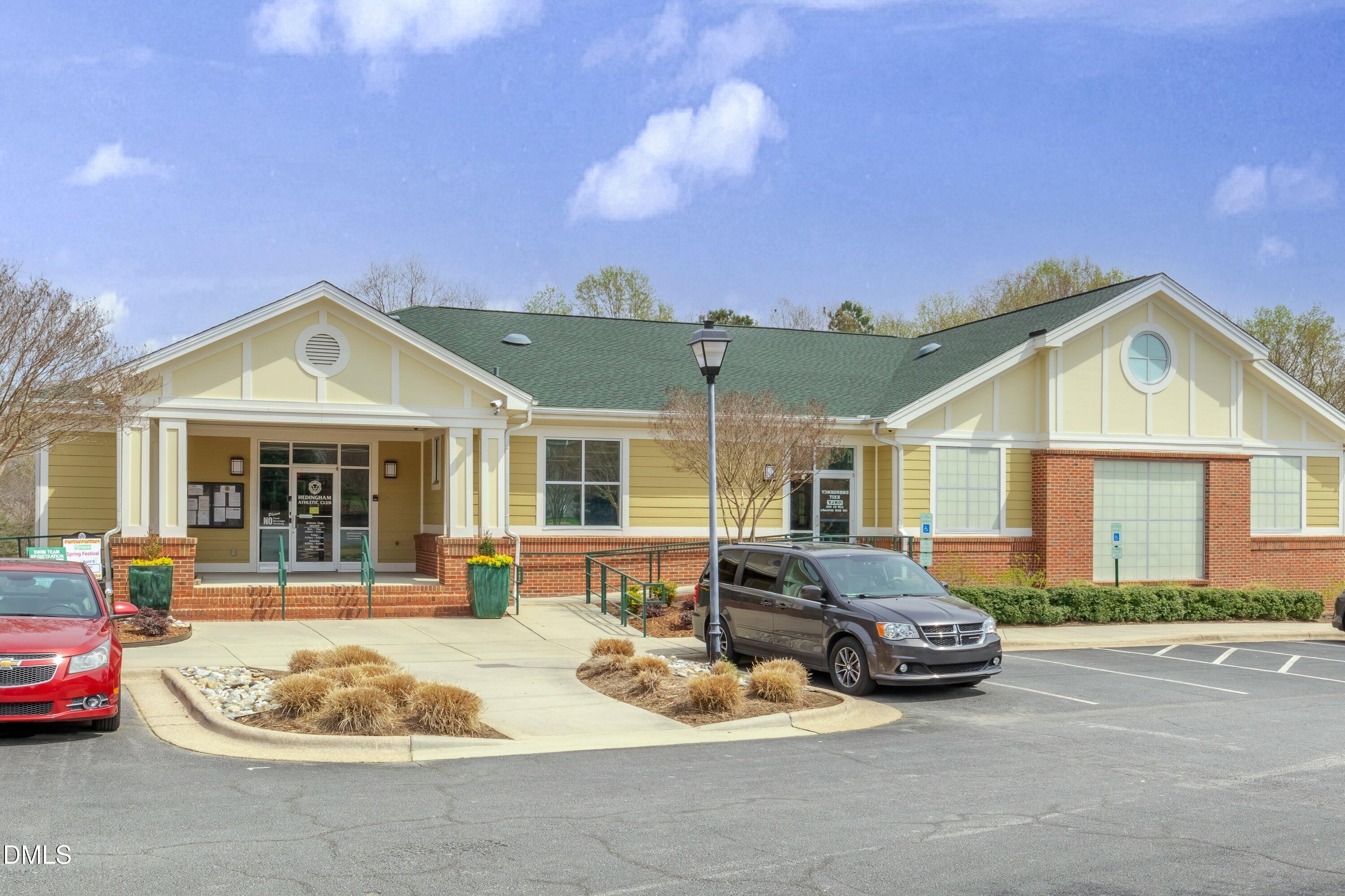 1916 Spanish Bay Court Raleigh, NC 27604 - Photo 43 of 63 a front view of a house with a garden and patio