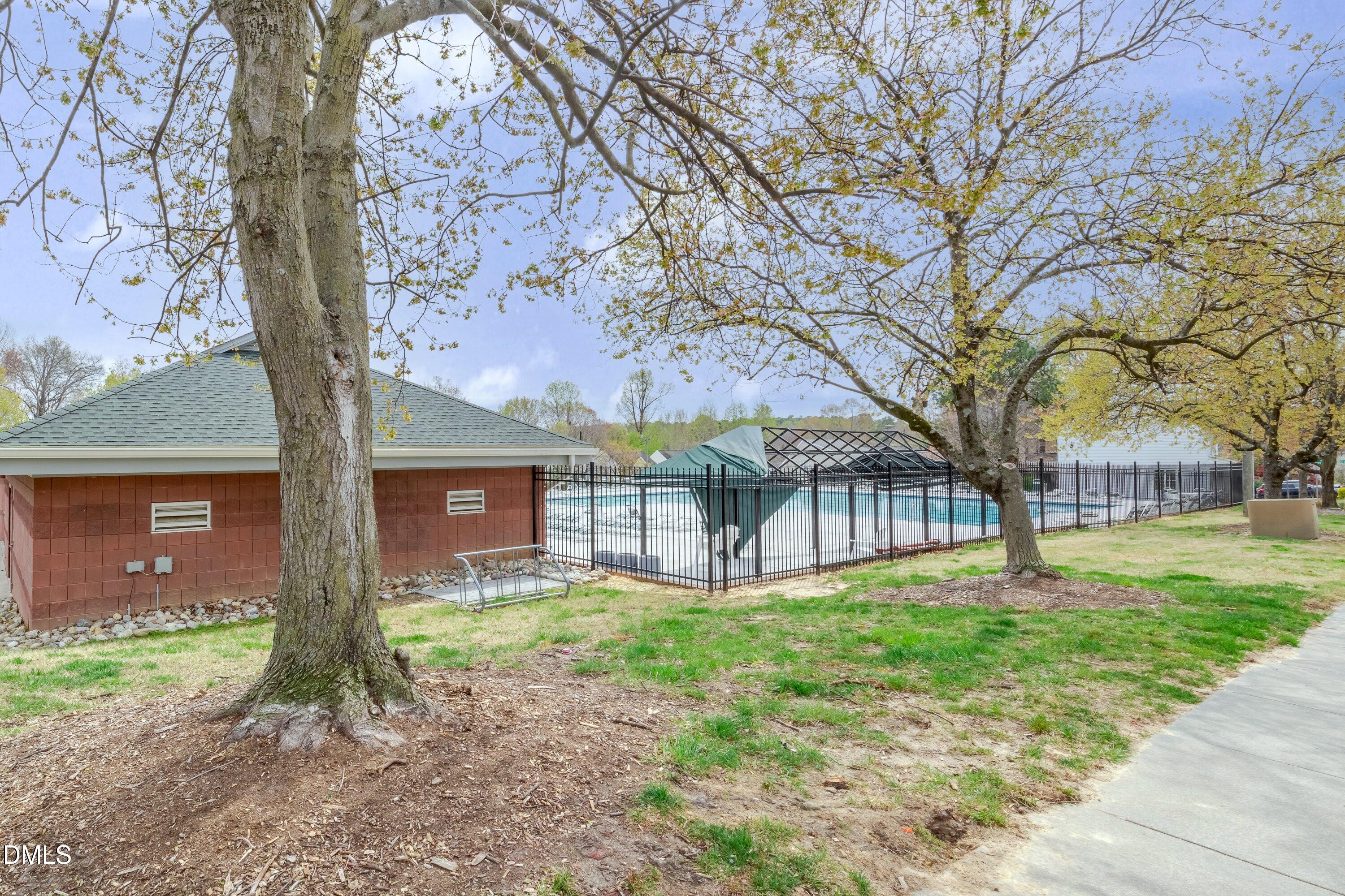 1916 Spanish Bay Court Raleigh, NC 27604 - Photo 53 of 63 a front view of house with yard and green space