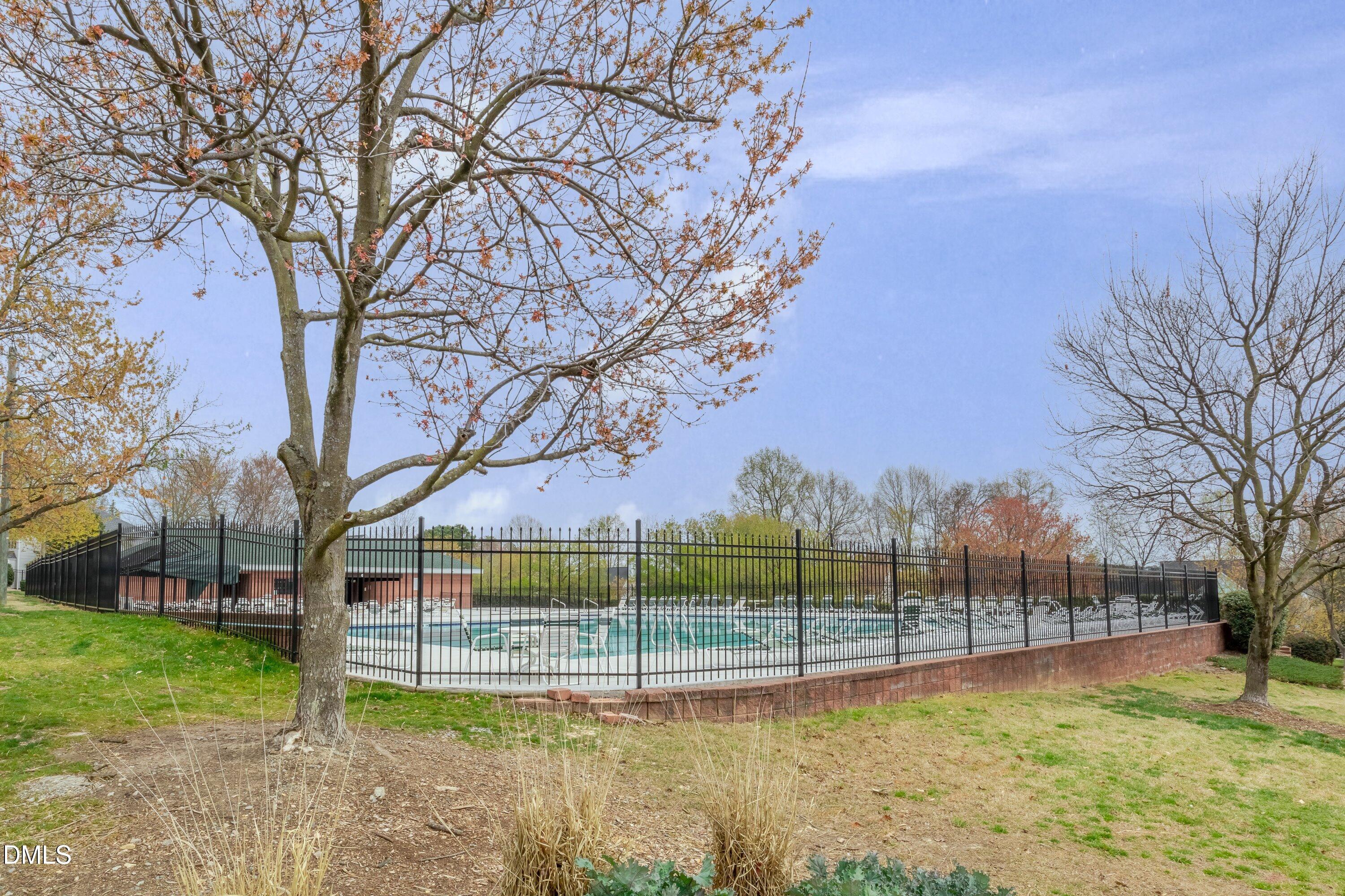 1916 Spanish Bay Court Raleigh, NC 27604 - Photo 54 of 63 a view of a yard with a large tree